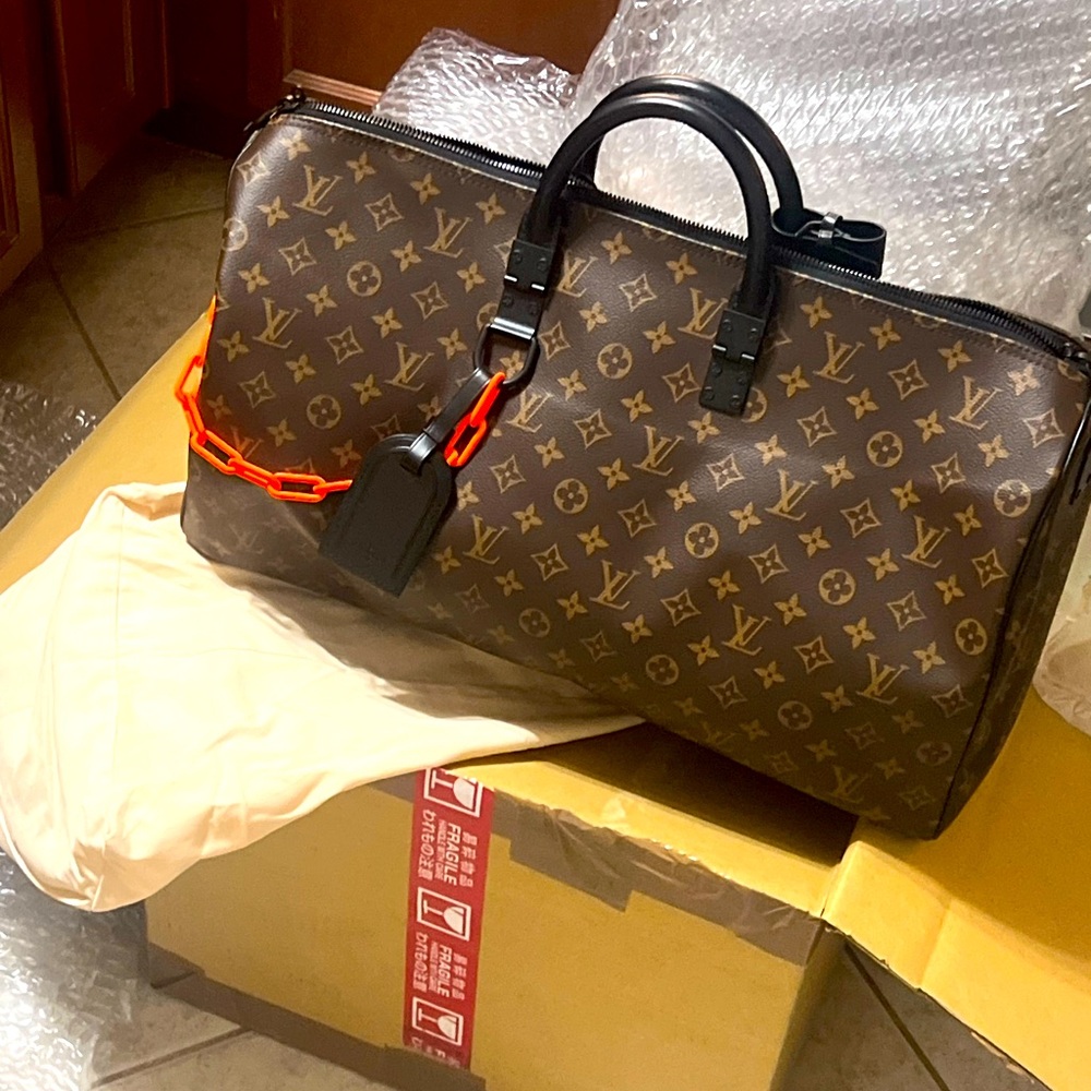 LOUIS VUITTON KEEPALL 50 SOLAR RAY NEW